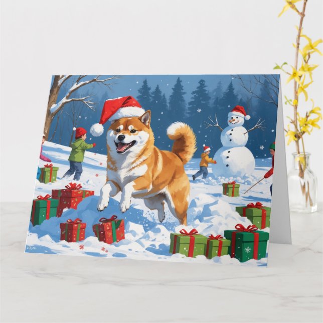 Shiba Inu springar i snö med julhatt Kort (Gul blomma)