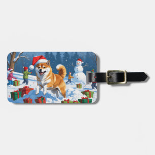 Shiba Inu springer i snö med julhatt Bagagebricka