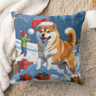 Shiba Inu springer i snö med julhatt Kudde