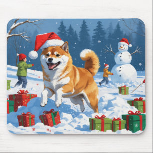 Shiba Inu springer i snö med julhatt Musmatta