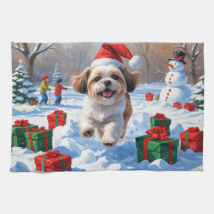 Shih Tzu springer i snö med julhatt Kökshandduk