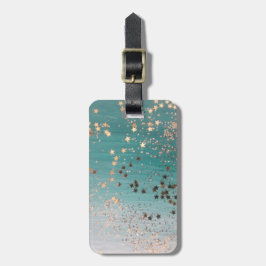 Shimmery Guld Stars på Teal Bagagebricka