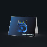 Shiny Blue Chanukkah Menorah Helgkort<br><div class="desc">En moderniserande,  metallisk,  blå Chanukkah-menorah,  med en lejon i silhouette,  mot en mörk,  natteliknande bakgrund. Alla nio ljusen är tända. Texten "Lycklig Hanukkah" står också i blått och vitt.</div>