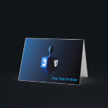 Shiny Blue Dreidel Helgkort<br><div class="desc">En moderniserande,  metallisk,  blå dröm mot en mörk,  nattlig bakgrund. Två av hebreiska brev hittades på en dröm,  nunna och shin,  glöd. Lägg till din egen text.</div>