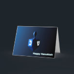 Shiny Blue Dreidel Helgkort<br><div class="desc">En moderniserande,  metallisk,  blå dröm mot en mörk,  nattlig bakgrund. Två av hebreiska brev hittades på en dröm,  nunna och shin,  glöd. Texten "Lycklig Hanukkah" står också i blått och vitt.</div>