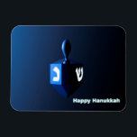 Shiny Blue Dreidel Magnet<br><div class="desc">En moderniserande,  metallblå modell mot en mörk,  nattlig bakgrund. Två av hebreiska brev hittades på en dröm,  nunna och shin,  glöd. Texten "Lycklig Hanukkah" står också i blått och vitt.</div>
