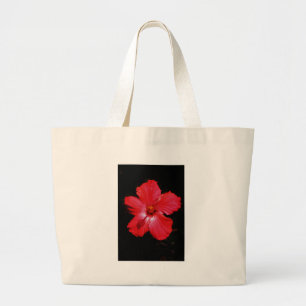 Shock rosa Red Hibiscus blomma på Black Jumbo Tygkasse