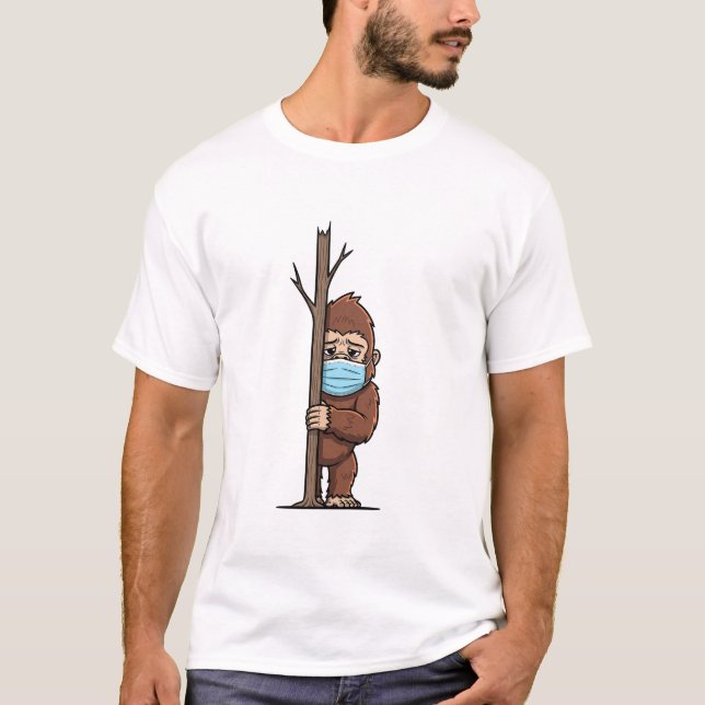 Shy Bigfoot in Medical Mask Peeking Behind T Shirt (Framsida)