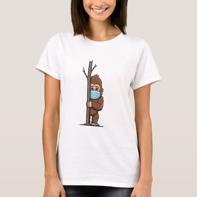 Shy Bigfoot in Medical Mask Peeking Behind T Shirt (Framsida)