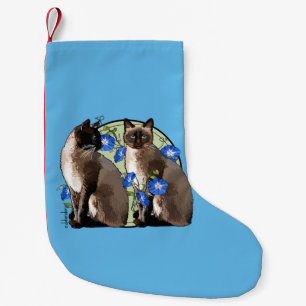 Siamese katter med morgonhärligheter liten julstrumpa