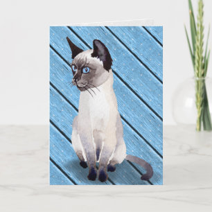 Siamese kattunge för födelsedag på blåttträ kort