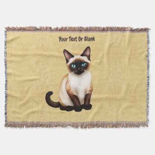 Siamesisk katt på gammal Papper Filt