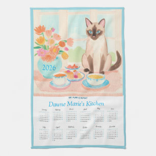 Siamesisk katt, tekoppar och kökshanddukskalender kökshandduk