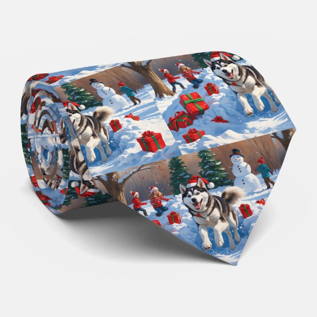 Siberisk Husky som springer i snö med julhatt Slips (Rullad)