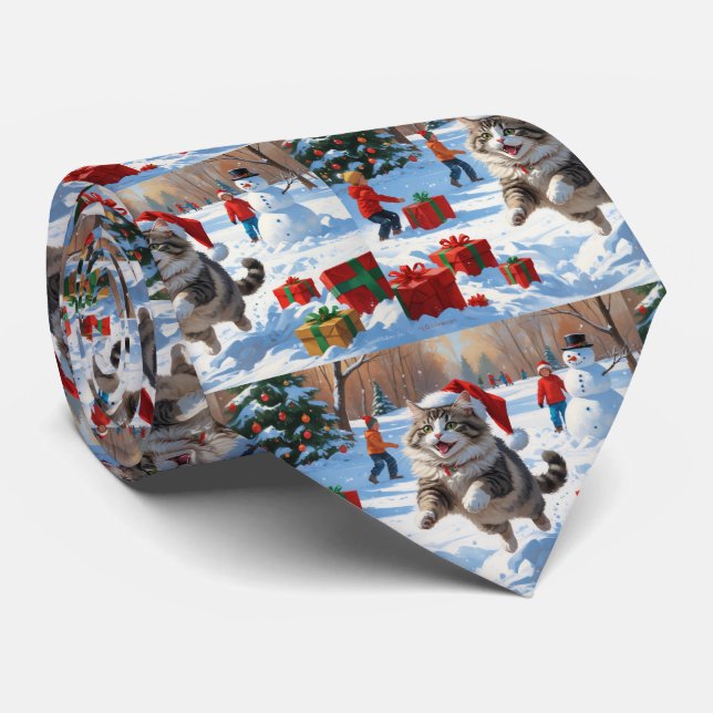 Sibirisk katt springer i snö med julhatt slips (Rullad)