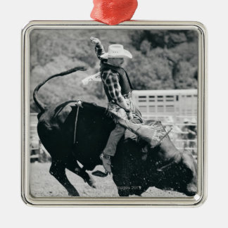 Sidan beskådar av ryttaren som hänger på till att julgransprydnad metall