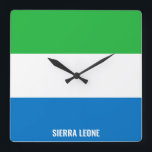 Sierra Leone Flagga Dazzling Patriotic Fyrkantig Klocka<br><div class="desc">Sierra Leone Flagga Dazzling Patriotic Square Wall Clock i färg och inslag i Sierran Leone National flagga som täcker framsidan av klockan. Flagga kompletteras med texten "Sierra Leone" på grund. Anpassadet Text är fullt ut med funktionen "Anpassa den!". Du kan ändra den, ta bort den eller lägga till en egen....</div>