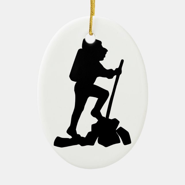 Silhouette av en fotvandrare som fotvandrar upp julgransprydnad keramik (Framsidan)