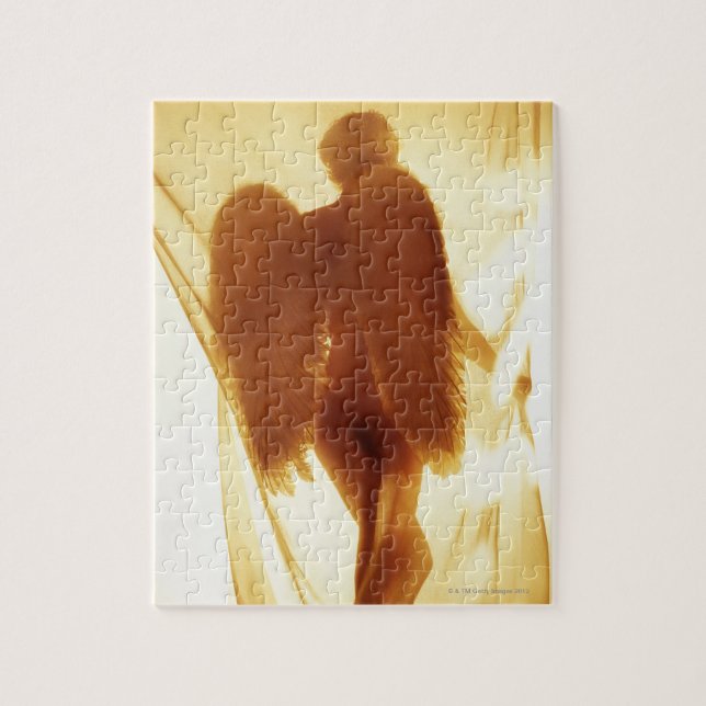 Silhouette med en ängel med vingar pussel (Vertikal)