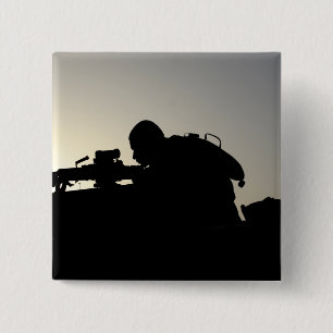 Silhouette med en kvadratisk automatisk vapenkanna knapp