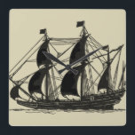 Silhouetten av frakten med att bölja seglar fyrkantig klocka<br><div class="desc">Den stiliga silhouetten av en seglingfrakt med att bölja seglar. Du kan även se några figurer som står på däcket som övervakar framsteg av frakten eller tycker om precis den kalla havsbrisen. Någon,  som älskar havet,  bör purchse detta biet!</div>