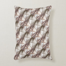 Silkesbeige med former som tittar relief eller dju prydnadskudde