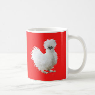 Silkiehöna på röd kaffemugg