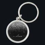 Silver Black Glitter Skriptskript, Monogram Girly  Rund Silverfärgad Nyckelring<br><div class="desc">Silver och Black Gnistra Glitter Script Monogram Namn nyckelringar (Nyckelring). Det gör perfekten söt 16-årsjubileum,  bröllop,  möhippa,  årsdag,  babydusch eller bachelorette-fest för någon som glam lyxen och chic stilar i kärlek.</div>
