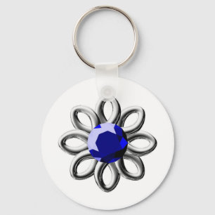 Silver blomma med blå sten nyckelring
