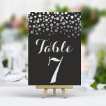 Silver Confetti Elegant Black-Bordsnumret Bordsnummer<br><div class="desc">Lägg till en gnutta glamor och gnistra till din bröllopsmottagning med de här elegant bordsnumren. De här korten skapar ett modernt och chic utseende med en kaskad av skuggande konfetti silver. Anpassa enkelt till bordsnumren för att skapa en sammanhängande och oförglömlig inställning till bord.</div>