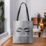Silver Glitter Gnistra Eyelash Monogram Namn Tygkasse<br><div class="desc">Silver Faux Foil Metallic Gnistra Glitter Brushed Metall Monogram Namn och initial Eyelash (Lash),  Eyelash Extensions och Ögon  Rosa Makeup Bag. Kudden gör perfekten söt 16-årsjubileum,  bröllop,  möhippa,  årsdag,  babydusch eller bachelorette-festgåva till någon som dekorerar hennes rum i trendiget coola stil.</div>