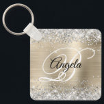 Silver Glitter Light Gold Foil Finare Monogram Nyckelring<br><div class="desc">Elegant silver glitter med gnistor mot en faux blek champagne guld borstad bild av folie i metall. Det går att anpassa kalligrafimonogrammet för svart och vitt finare i mitten. All sparsam och glansig inslag i denna moderna gigantiska design är digital grafik. Monogrammed värdefull nyckelring party favors för hennes speciella födelsedag....</div>