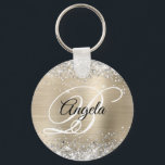 Silver Glitter Light Gold Foil Finare Monogram Nyckelring<br><div class="desc">Elegant silver glitter med gnistor mot en faux blek champagne guld borstad bild av folie i metall. Det går att anpassa kalligrafimonogrammet för svart och vitt finare i mitten. All sparsam och glansig inslag i denna moderna gigantiska design är digital grafik. Monogrammed värdefull cirkel formar nyckelring party favors för hennes...</div>