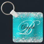 Silver Glitter Turquise Blue Foil Finare Monogram Nyckelring<br><div class="desc">Elegant silver glitter med gnistor mot ett faux aqua blue penselfolie av metall. Det går att anpassa kalligrafimonogrammet för svart och vitt finare i mitten. Du kan t.ex. ta bort namn och bara lämna ett monogram. All sparsam och glansig inslag i denna moderna gigantiska design är digital grafik. Monogrammed värdefull...</div>