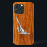 Silver Regatta Sailboat på Teak Veneer<br><div class="desc">Ett silver-krom som regattassegelbåtscen på en teak-stil-bakgrundsdekör. En gammal modern nautisk gåva. Använda länken "Be den här designern" om du vill kontakta oss med dina speciella designförfrågningar eller om du vill ha hjälp med något av dina anpassningsprojekt.</div>