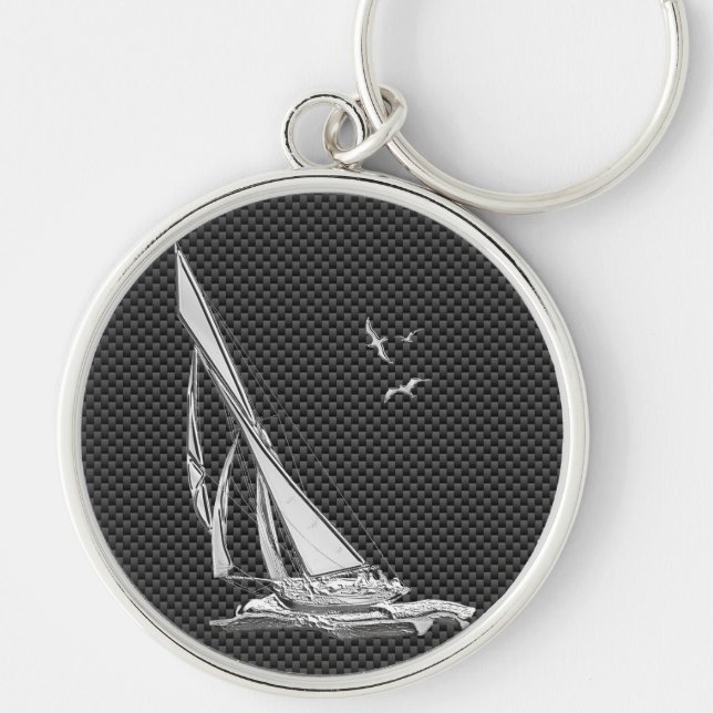 Silver segelbåt på kolfiberdekan rund silverfärgad nyckelring (Framsidan)