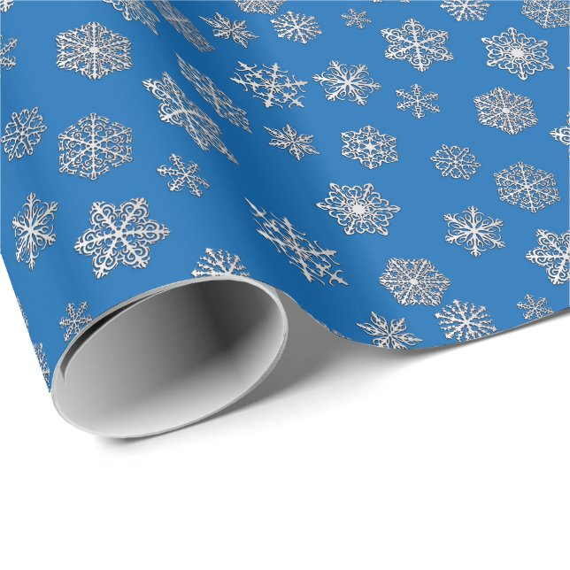 Silver snöflingor på en koboltblå bakgrund presentpapper (Rullad Hörn)