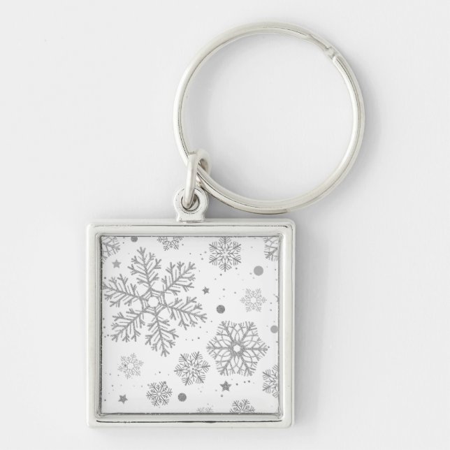 Silver snöflingor på vitt fyrkantig silverfärgad nyckelring (Framsidan)