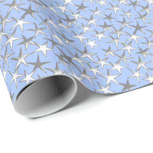 Silver stjärnor, på blek blå presentpapper