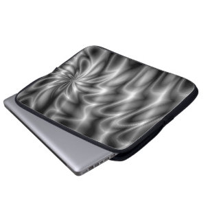 Silver virvlar runt laptop sleeve