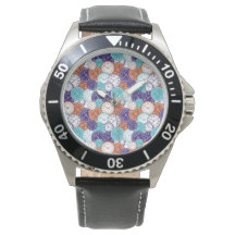 Silverfärgat armbandsur med en färgrik geometrisk 