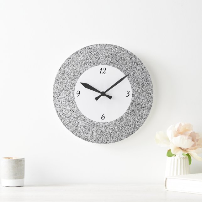 Silvergrått ljus glitter gnistrar svart vitt stor klocka (Hem)
