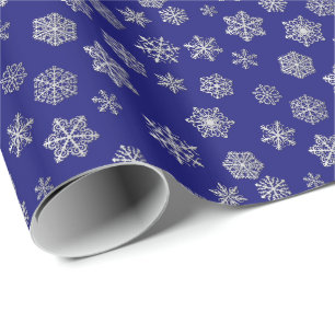 Silversnöflingor på en blåttbakgrund presentpapper