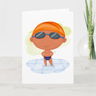 Simmarpojke i simgoggles och simmossa kort