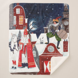 Sinterklaas och Piet på taken av Amsterdam