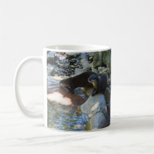 **"Sips by Stream: Otters Drinking from River Kaffemugg