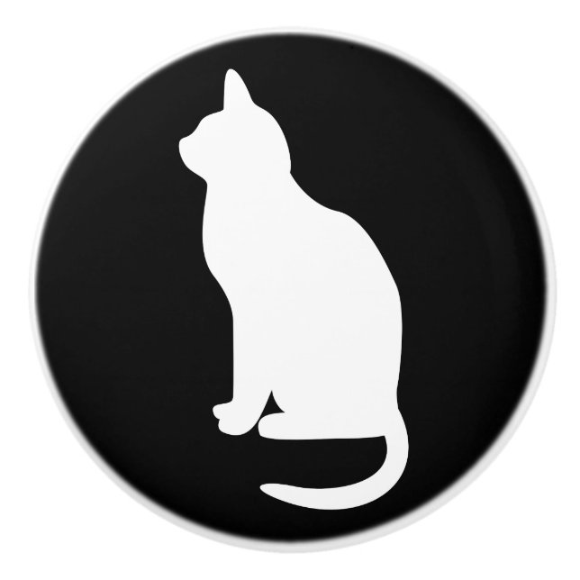 Sittande vit katt vänd åt vänster knopp (Framsidan)