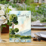 Sjö Evergreen Watercolor Bröllop Editable Bordsnummer<br><div class="desc">Sjö Evergreen-kort för bordsnummer i bröllop med idylliskt landskap. Vattenfärgsskena land med träd och grönt, blå berg och ett stillastående sjö under ett tydligt blå himmel. Konstruktionen är i skuggor av dammig blått, periwinkle och grönt och är skriven med elegant och modern typografi. Bläddra i min Sjö Evergreen-samling för matchande...</div>
