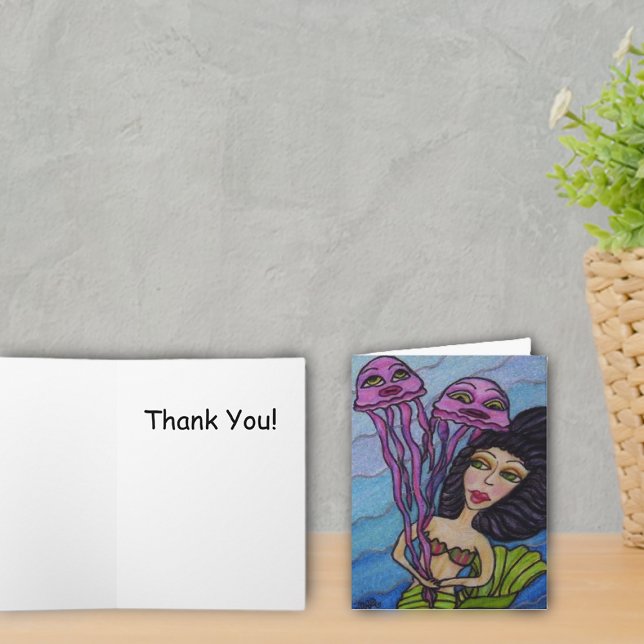 Sjöjungfru med jellyfish tackkort (Dark haired mermaid with purple jellyfish on blue thank you cards.)