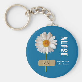 Sjuksköterskor är alla hjärtan. Smilande Daisy Gif Nyckelring